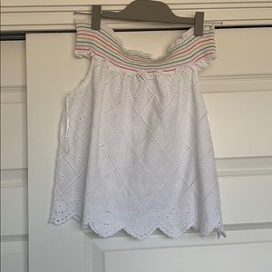 White, sleeveless, shoulder-laying top!